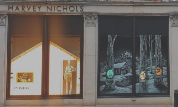 Snow window art, bespoke snow spray installations, snow spray stencils, Christmas window art, Christmas window decoration with snow spray, snow spray art number 1 snow spray artist number 1 window art easy to remove snow spray art sustainable window stencils reusable window stencils Harvey Nichols Christmas windows