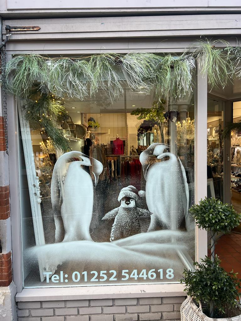 Snow window art, bespoke snow spray installations, snow spray stencils, Christmas window art, Christmas window decoration with snow spray, snow spray art number 1 snow spray artist number 1 window art easy to remove snow spray art sustainable window stencils reusable window stencils