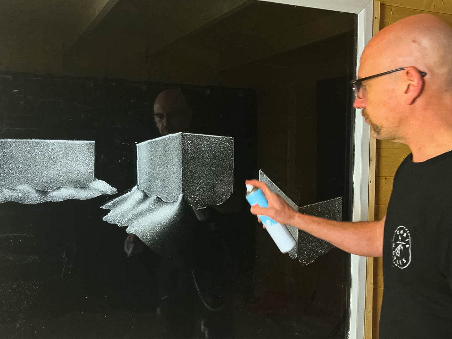 Snow window art, bespoke snow spray installations, snow spray stencils, Christmas window art, Christmas window decoration with snow spray, snow spray art number 1 snow spray artist number 1 window art easy to remove snow spray art sustainable window stencils reusable window stencils snow spray course window art course