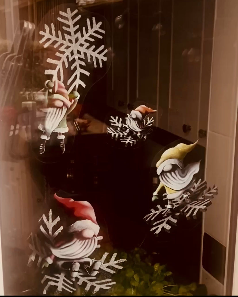 Snow window art, bespoke snow spray installations, snow spray stencils, Christmas window art, Christmas window decoration with snow spray, snow spray art number 1 snow spray artist number 1 window art easy to remove snow spray art sustainable window stencils reusable window stencils snow window